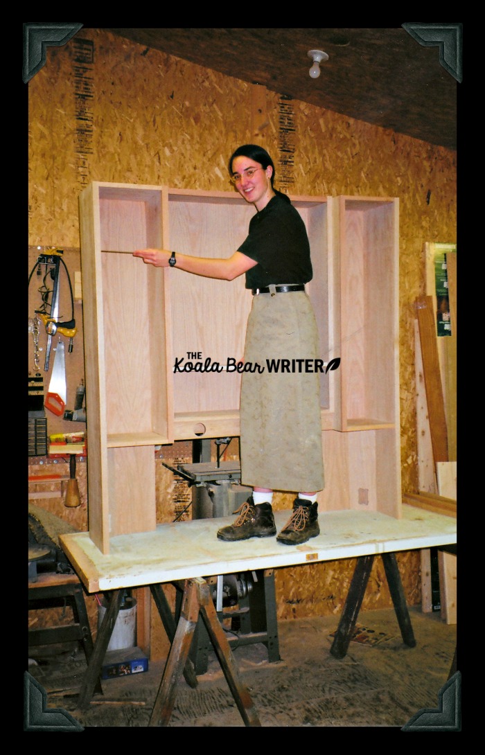 Bonnie measuring her wood desk