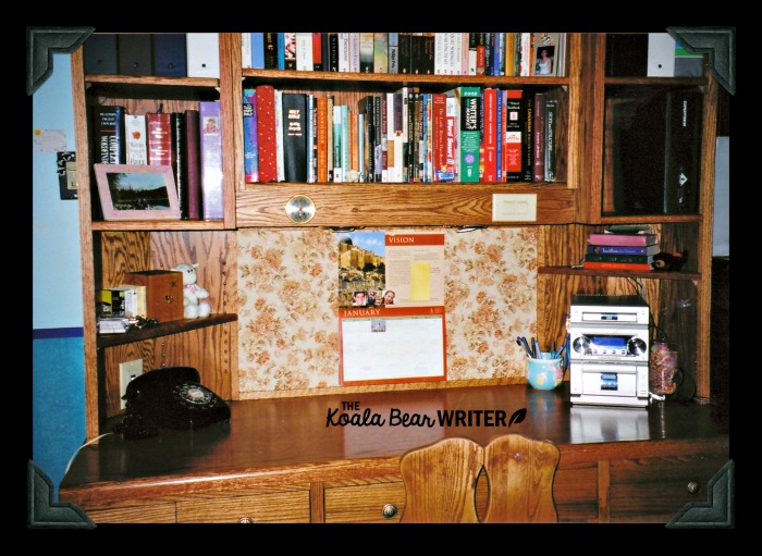 Wood desk with a bookshelf on top