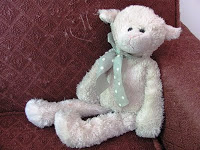 A toddler's stuffed lamb