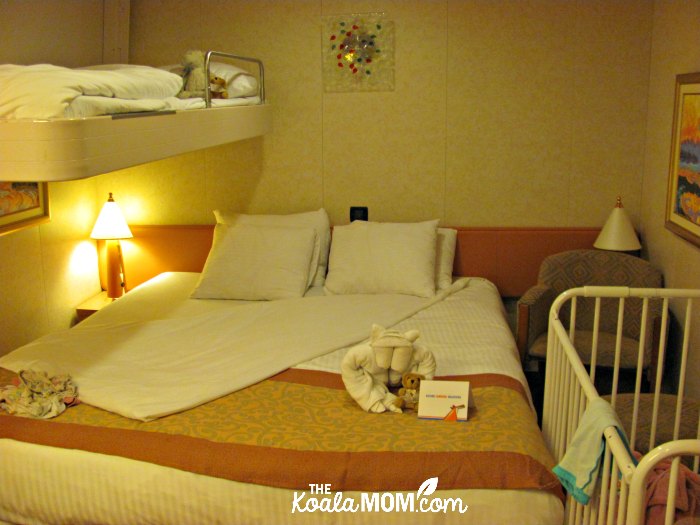 Interior room on the Carnival Splendor, with a fold-down bunkbed and a crib.