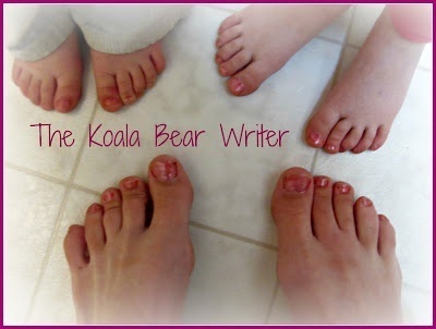 mom and two daughters with painted toenails