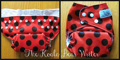 Kawartha Cloth diapers are affordable Canadian pocket diapers that come in cute colours, like the "ladybug diaper" shown here with the microfiber insert.
