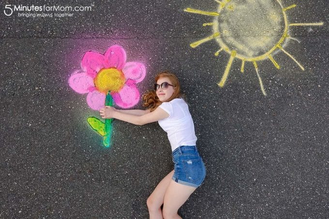 Girl holding flower in spray chalk photography. (Photo credit: 5 Minutes for Mom)