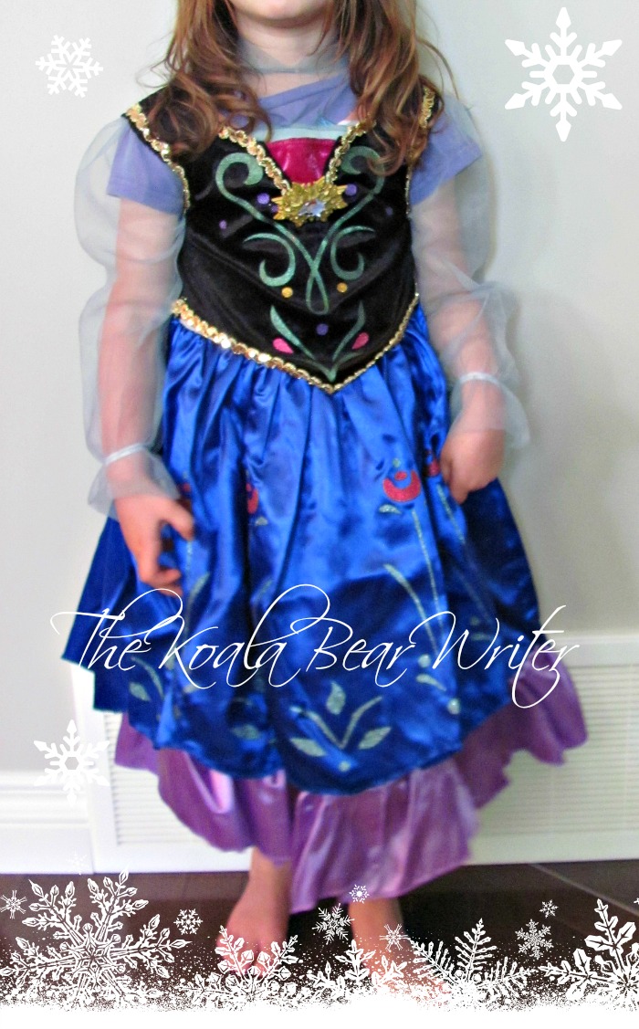 Lily wearing her Anna costume from BuyCostumes.com - she and Sunshine love their Elsa and Anna costumes