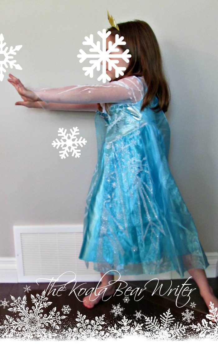 Sunshine strikes an Elsa pose - she and Lily love their Elsa and Anna costumes