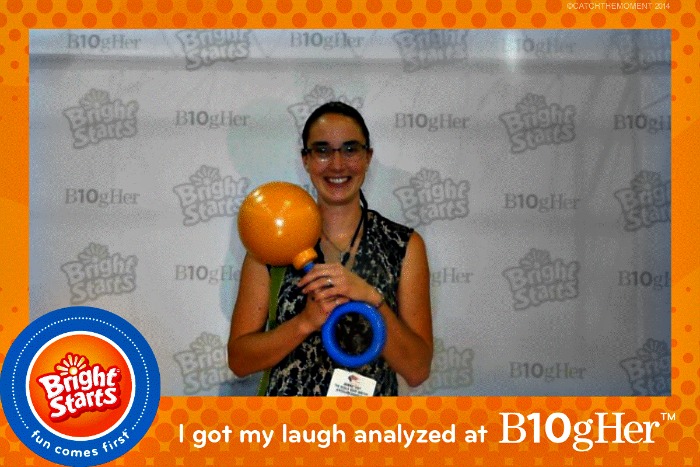 Bonnie Way posing at the Bright Starts booth at BlogHer14 conference