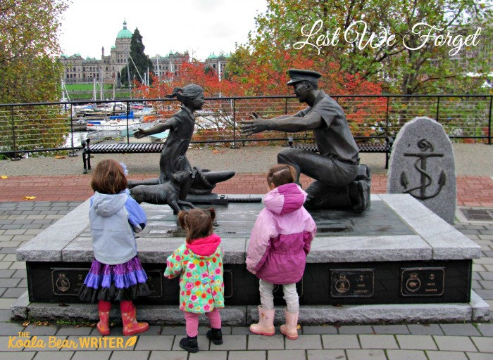 Children at a Navy memorial - Lest we forget