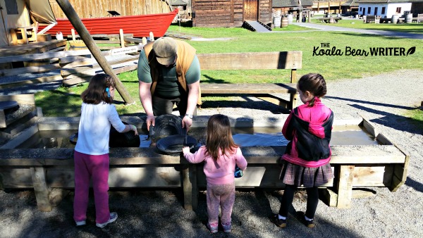Girls panning for gold at Fort Langley National Historic Site, BC