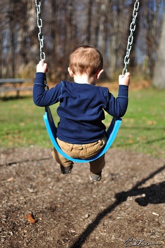 Toddler on swing