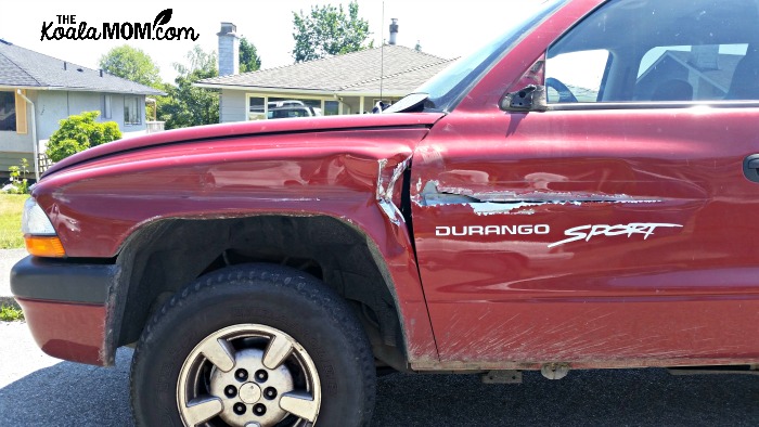 Red Dodge Durango Sport after accident