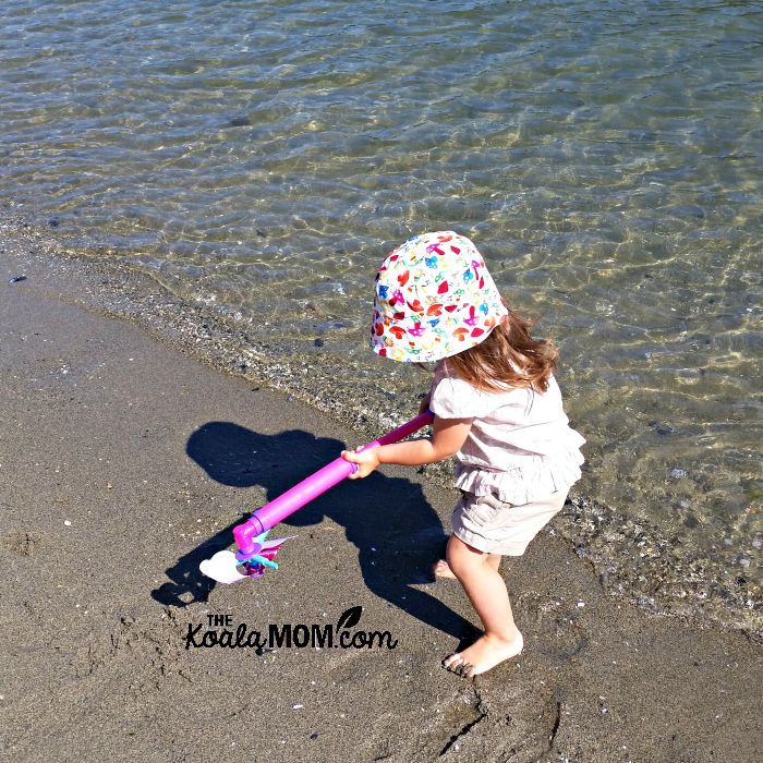 Jade trying out her new water squirter at Barnet Marine Park