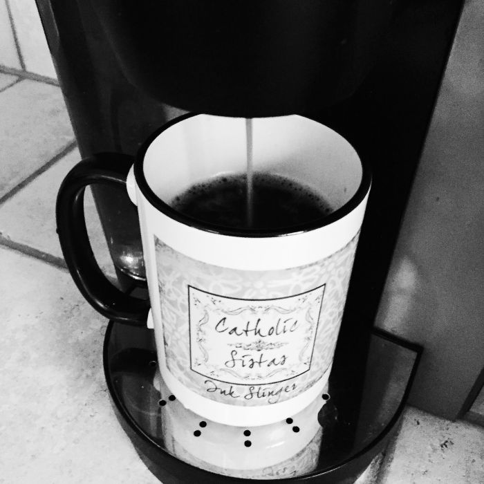 Catholic Sistas coffee mug being filled with fresh coffee - the perfect start to a day in the life of a mom blogger