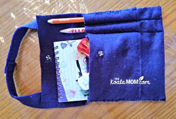 Felt notebook case with notebook, pencils, eraser and pencil sharpener