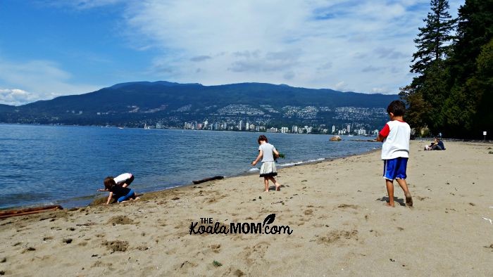 Kids playing at Third Beach in Stanley Park