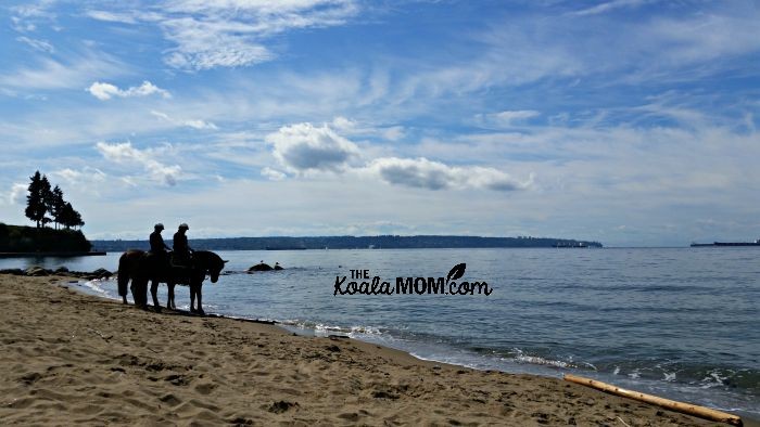 Mounted police on Third Beach at Stanley Park