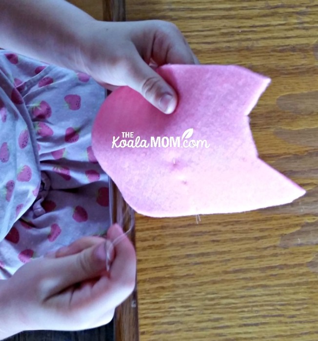 5-year-old sewing a felt kitten