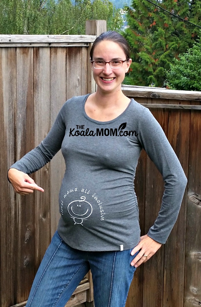 Long-sleeve grey top with "hotel mama all-inclusive" embroidered on tummy