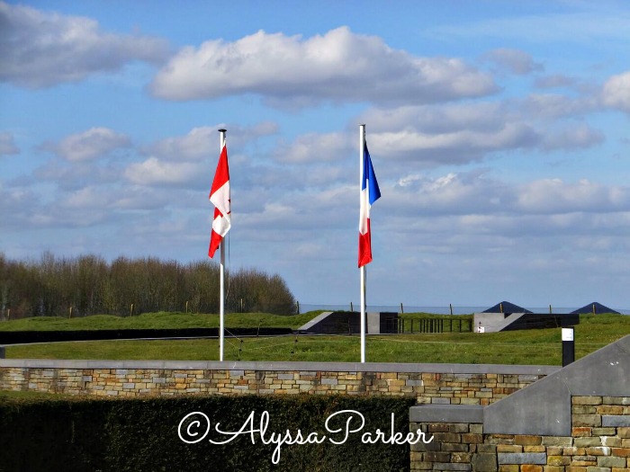 Canadian and French flag at the war memorial