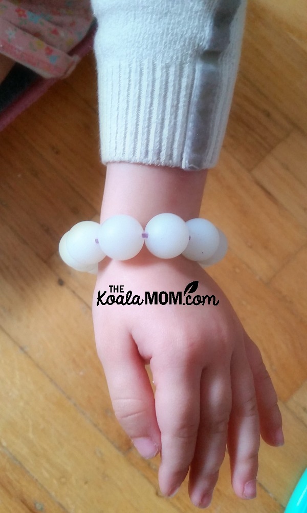 Jade wearing her glow-in-the-dark silicone bracelet