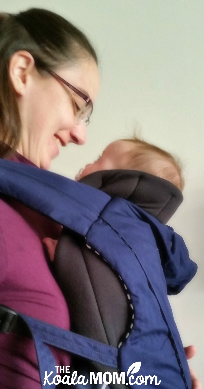 Bonnie Way carrying her baby in the Juno baby carrier by Mountain Buggy