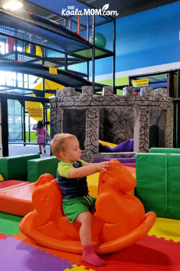 Toddler playing at an indoor play area in Vancouver.
