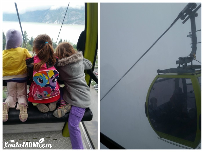 Three girls riding the Sea to Sky Gondola up the mountain in the fog