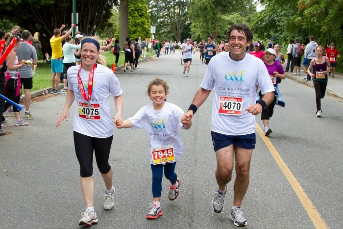 Cassie Porte running with her parents