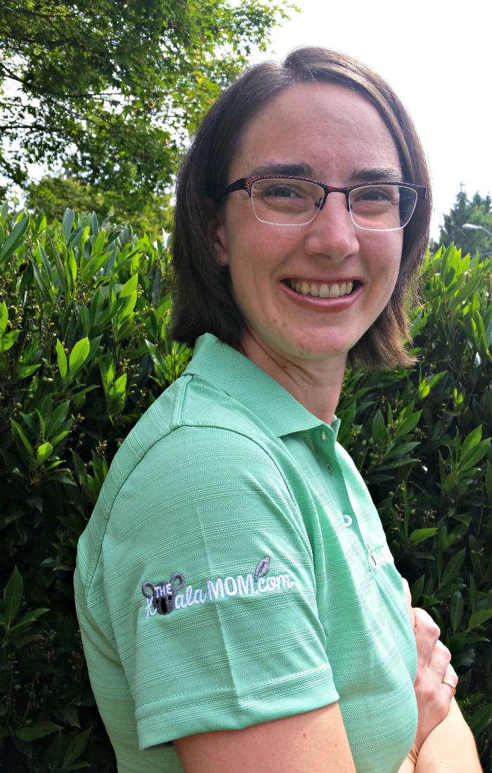 The Koala Mom green polo with a logo in the sleeve