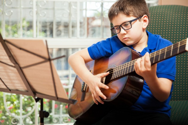 Boy playing guitar