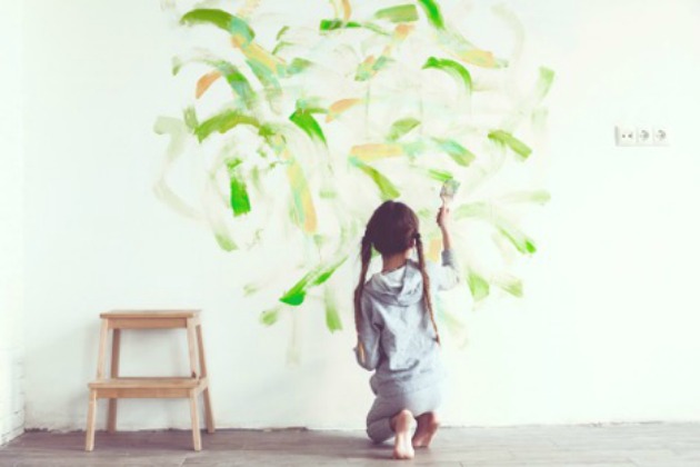 Child painting walls