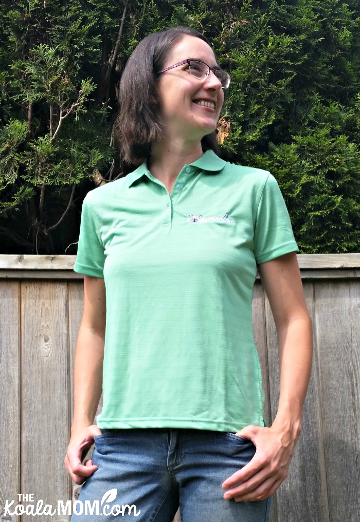 Bonnie Way wearing a green polo with the Koala Mom logo on it from Bravo Apparel