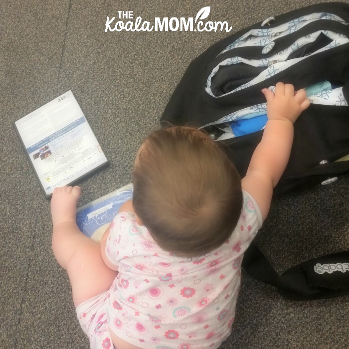 Baby playing with EquiptBaby Diaper Bag