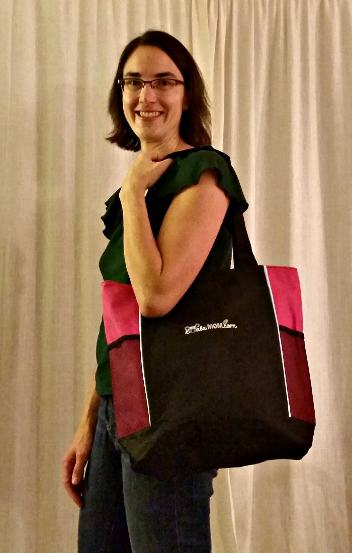 Pink shoulder bag with The Koala Mom logo