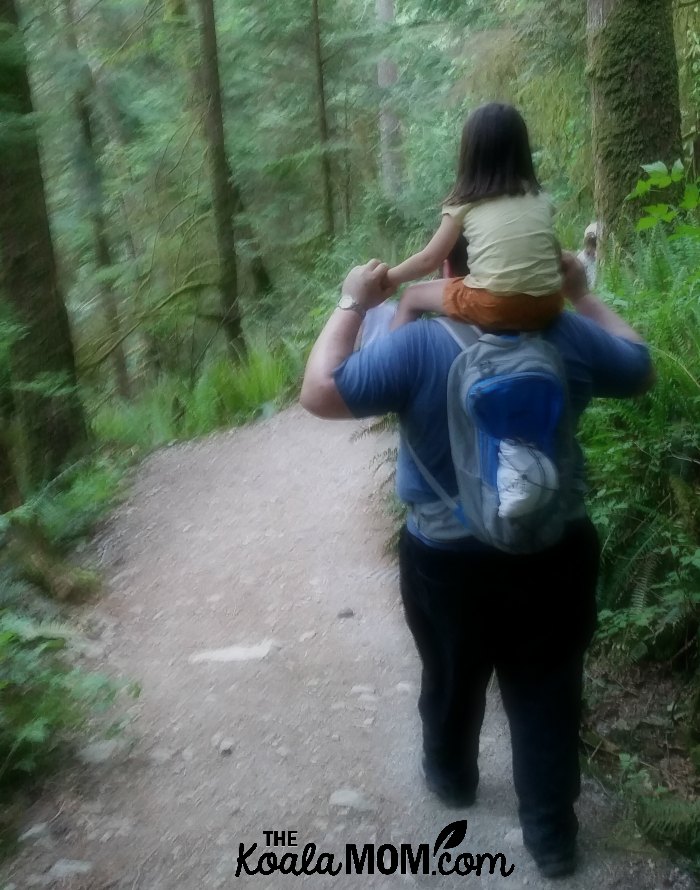 Jade riding on Daddy's shoulders along the Buntzen Lake Trail