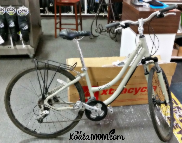 Norco hybrid bike beside an Xtracycle cargo bike conversion kit