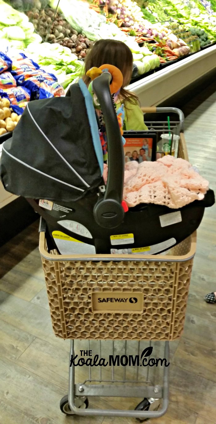 Baby car seat on a grocery cart