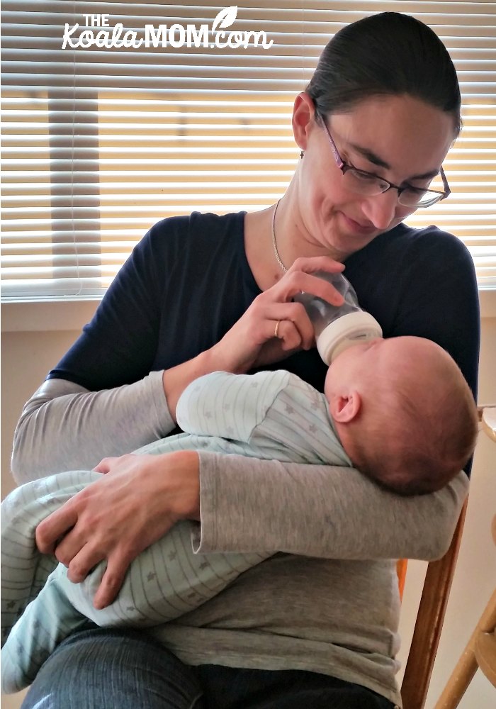 Mom bottle-feeding 2-month-old baby with the Nuk Simply Natural Feeding System