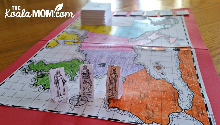 Journey through the Middle Ages game board from Home School in the Woods - make history fun for your kids with trivia questions and collectible game pieces!