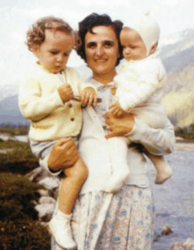 Gianna Beretta Molla holding two of her children.