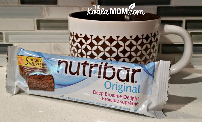 Nutribar deep brownie delight meal replacement bar with a coffee cup