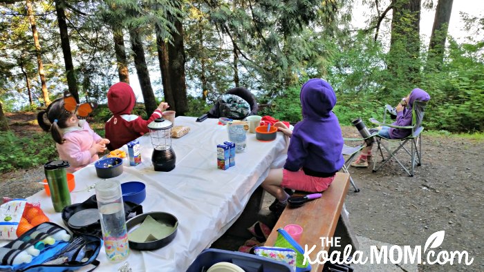 Kids eating a meal at Cultus Lake Campground.