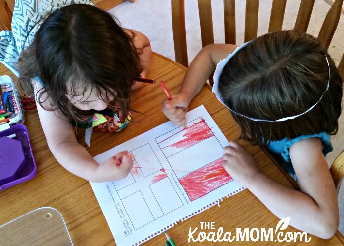 A two-year-old and a five-year-old colouring flags of England and Peru together as we study one of the lit-based unit studies from Branch Out World