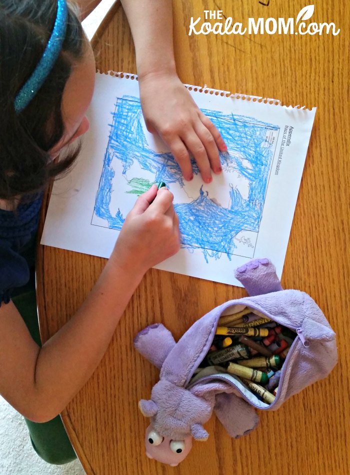 Lily working on a map from her Picture Book Explorers pack on Paddington Bear, one of the lit-based unit studies from Branch Out World