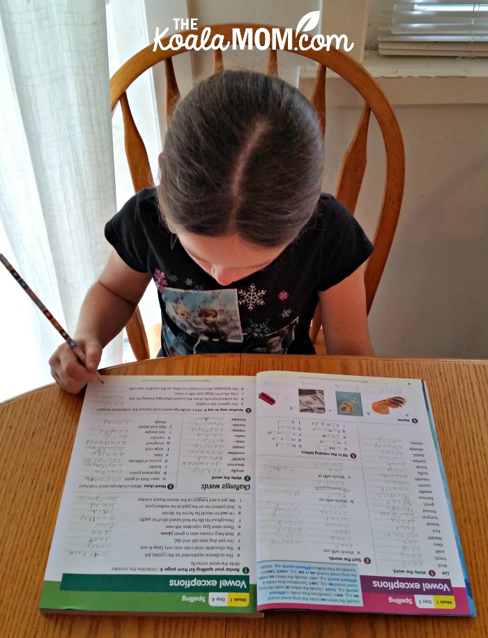 Sunshine doing her 200 Essential Reading Skills for Fith Grade workbook from Reading Eggs.