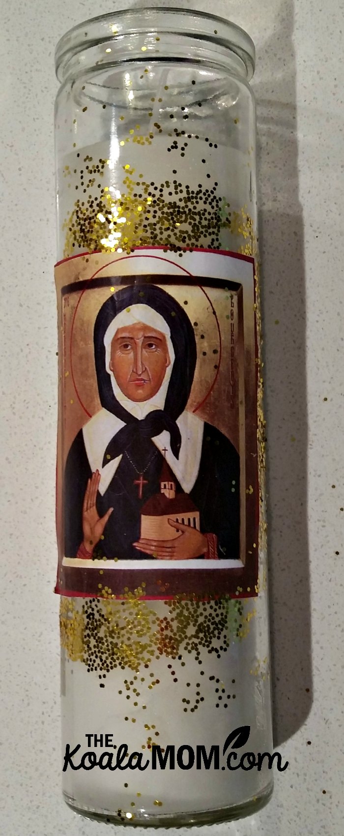 St. Marguerite Bourgeoys image on a candle - a craft at our Canadian Catholic All Saints' Day Party.