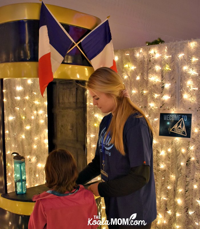 Stamping the kids' passports at Glow Gardens France.