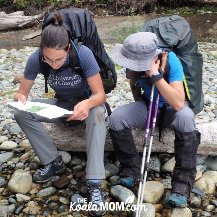 Bonnie and her friend looking at their West Coast Trail map.