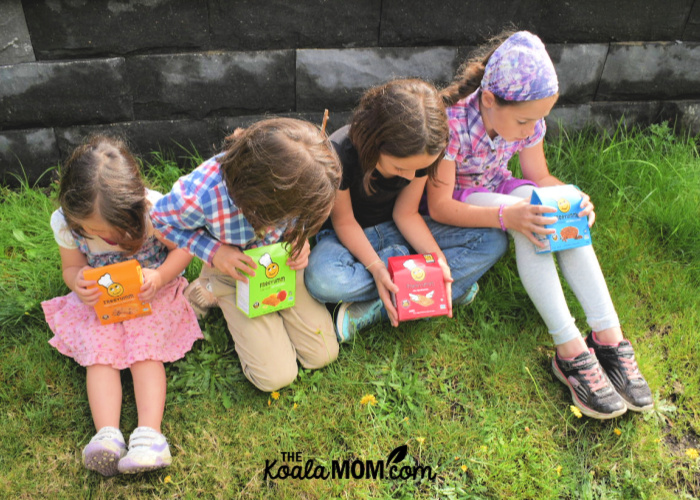 Kids with FreeYumm snacks.