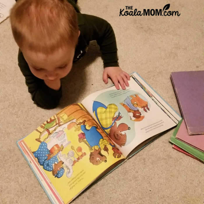 Play based preschool means leaving books where toddlers can reach them and look at when they want.