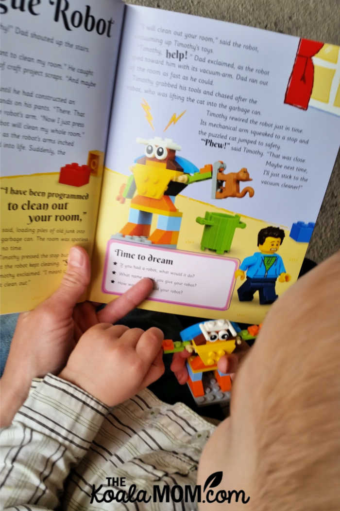 Two-year-old reading a story about his Lego model with Mommy.